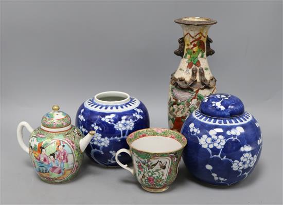A Chinese famille rose teapot, cup, vase and two Chinese blue and white jars and one cover tallest 25vm